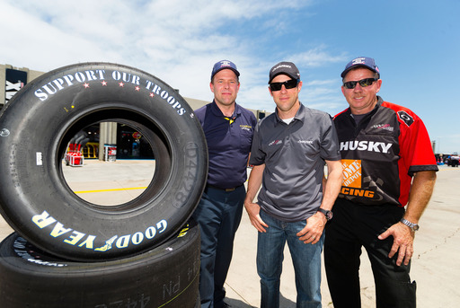 NASCAR driver Matt Kenseth and Tire Specialist Jerold Shires receive a delivery of Goodyear’s “Support Our Troops” tires from Goodyear Racing’s James Heath, a retired Marine at Charlotte Motor Speedway as Goodyear kicks off "Goodyear Gives Back." 