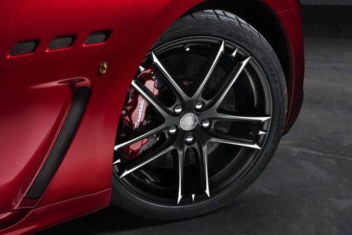Dual cast Brembo brakes and sport-tuned MC suspension are standard on the GranTurismo MC Centennial Edition. Wheel choice of MC or Trofeo designs offer a center medal-shaped centenary logo.