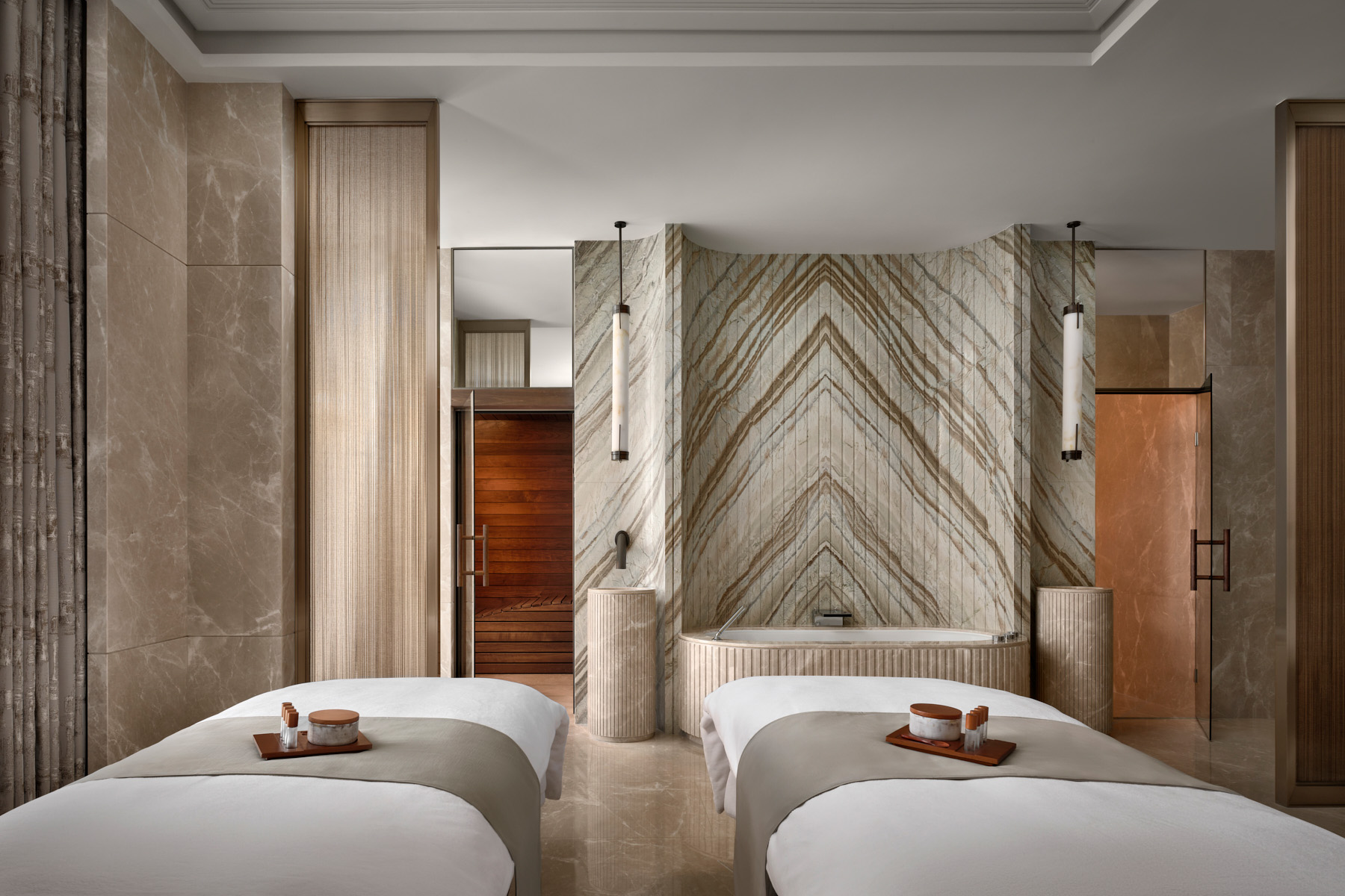 Gharieni massage tables and therapist equipment to sooth any tension in a serene atmosphere