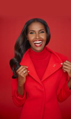 Model with red dress pin