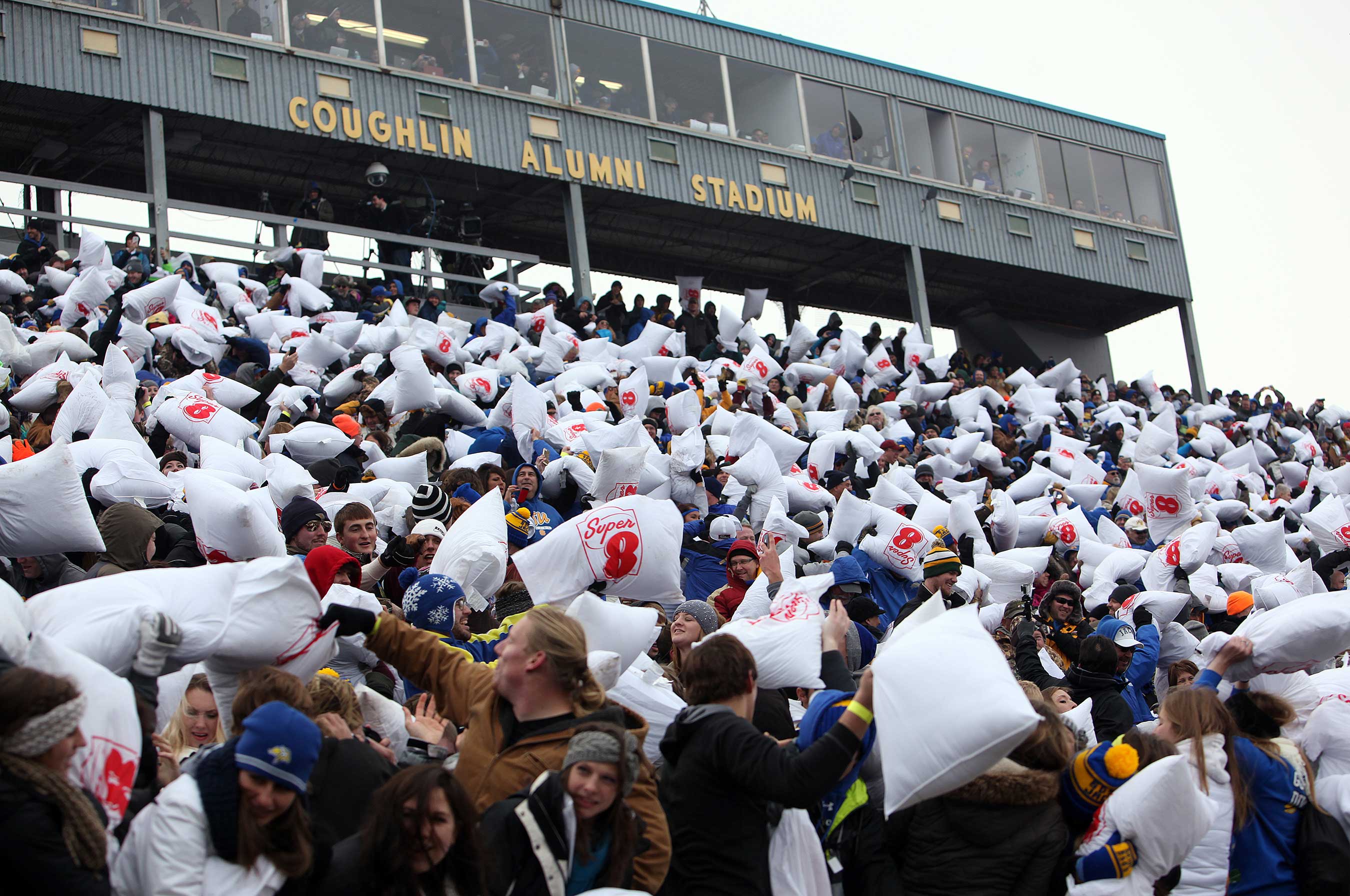 Super 8 Hotels breaks the Guinness World Record for the largest pillow fight at South Dakota State University. The 40th anniversary event featured TV host and former NSYNC pop star, Joey Fatone. (Photo by Jay Pickthorn/Invision for Super 8) 