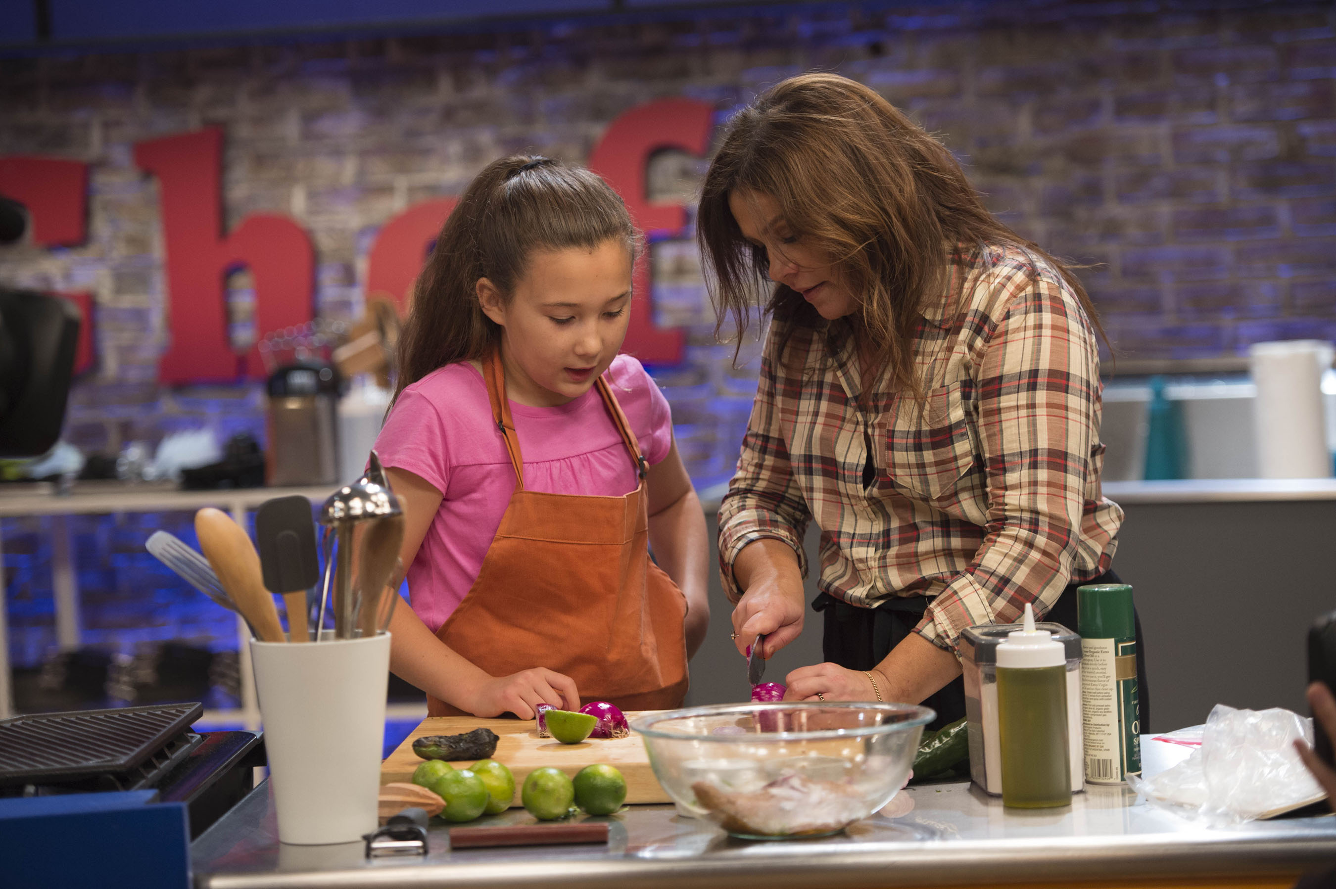 Host Rachael Ray Helps Kidtestant Scarlett on Food Network's Rachael Ray's Kids Cook-Off