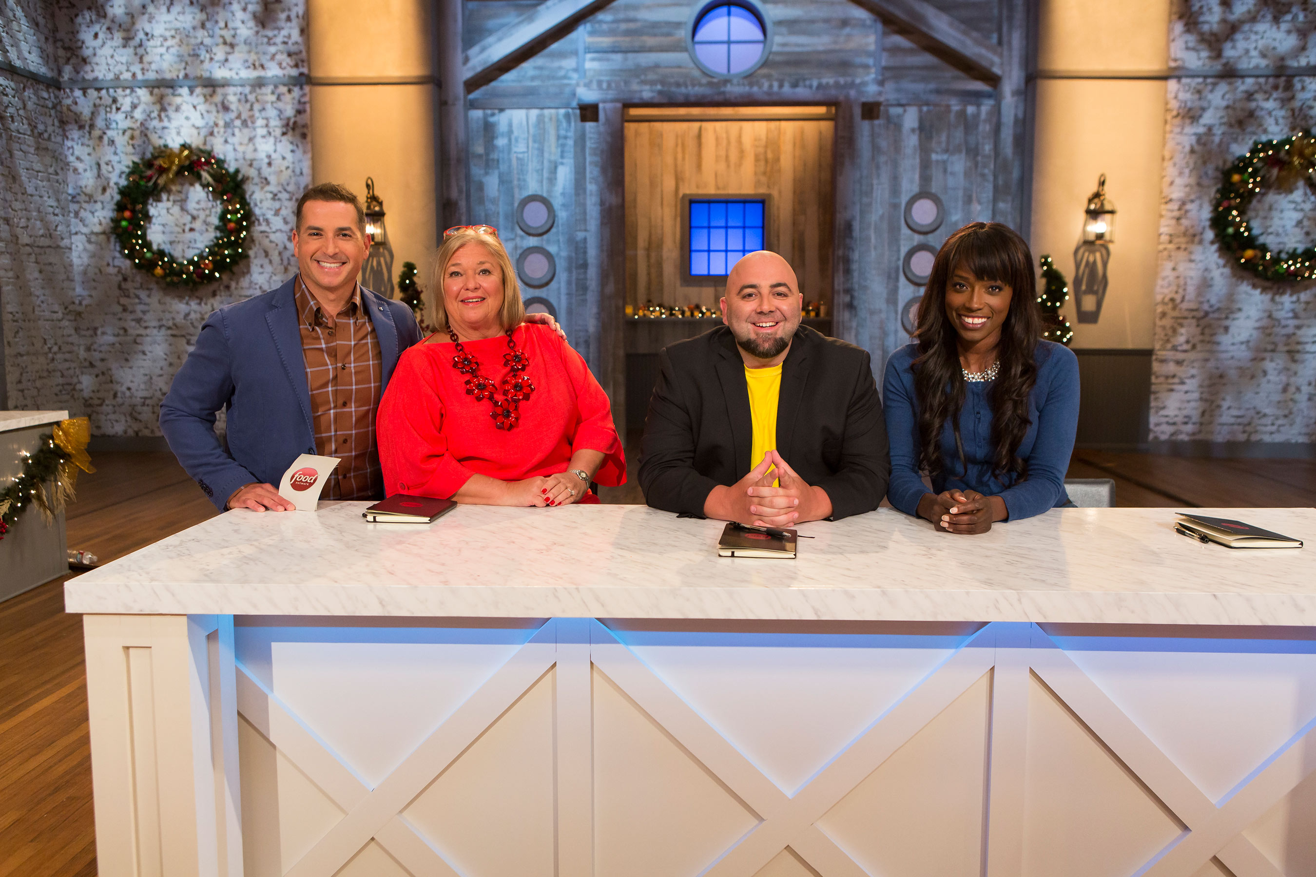 Host Bobby Deen and Judges Nancy Fuller, Duff Goldman and Lorraine Pascale on Food Network’s Holiday Baking Championship