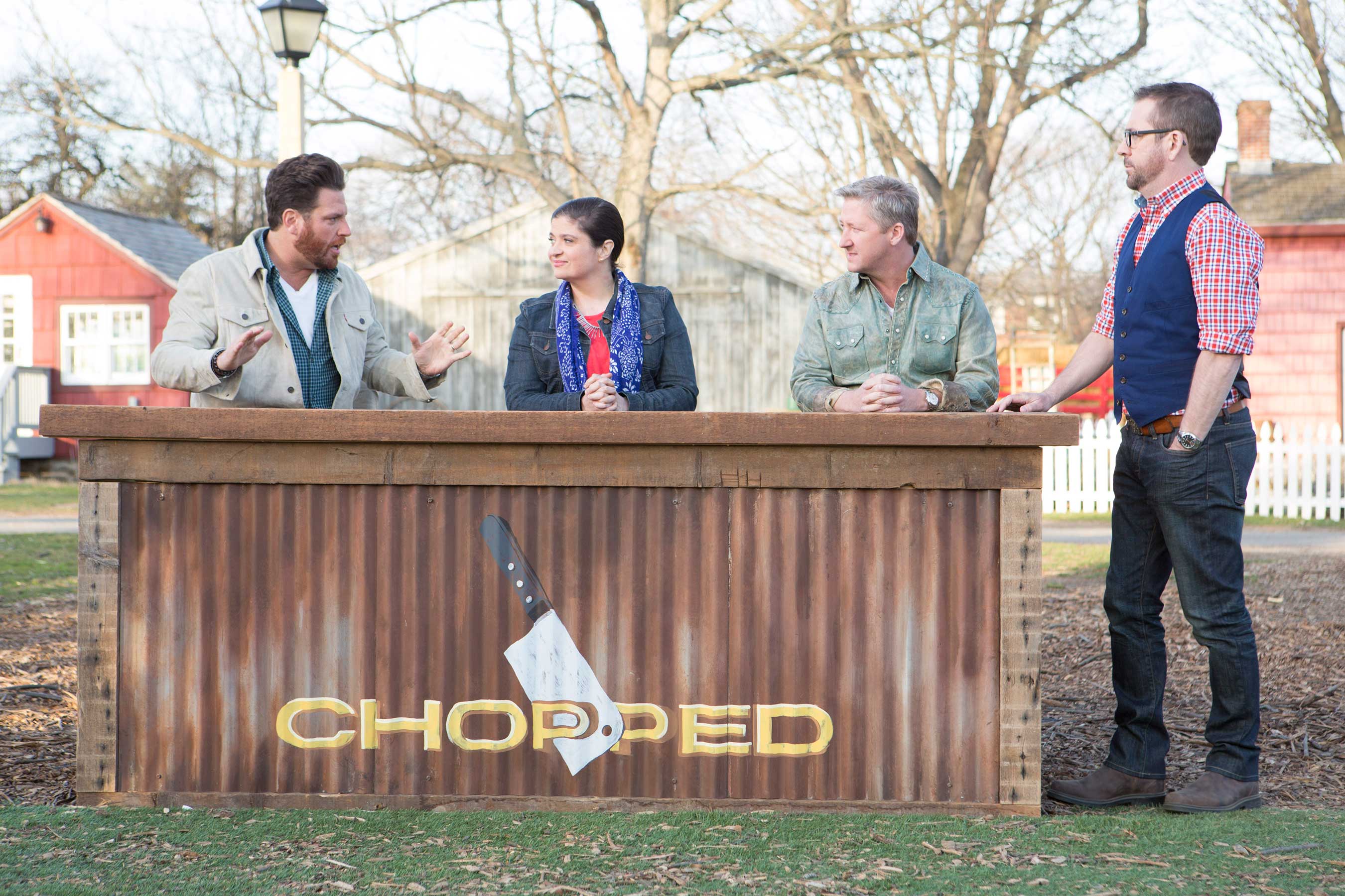 Host Ted Allen and Judges Scott Conant, Alex Guarnaschelli and Tim Love on Food Network's Chopped Grill Masters 