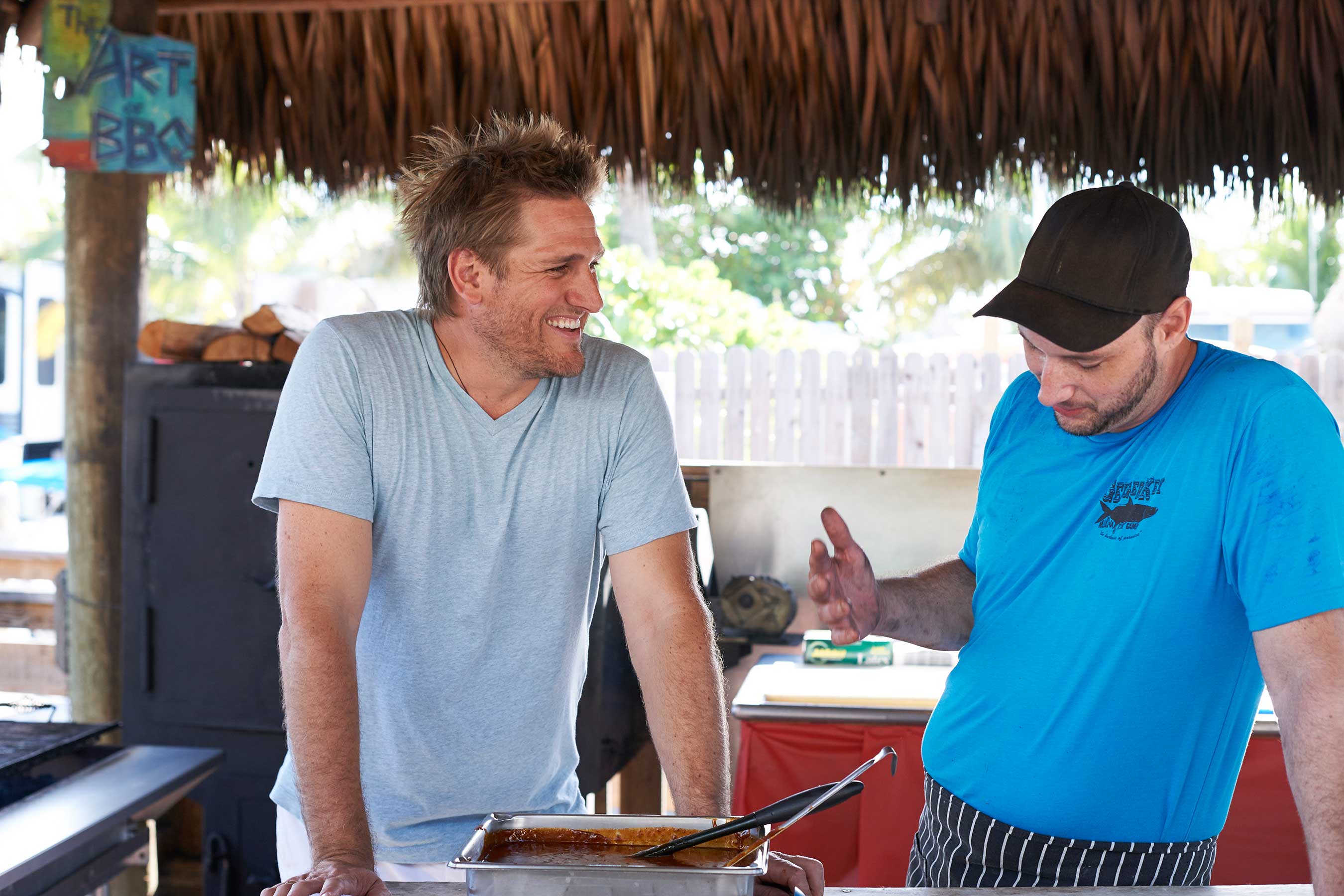 Curtis Stone with Chef Jason Wooters at The Fish Camp at Geiger Key on Food Network's Beach Eats