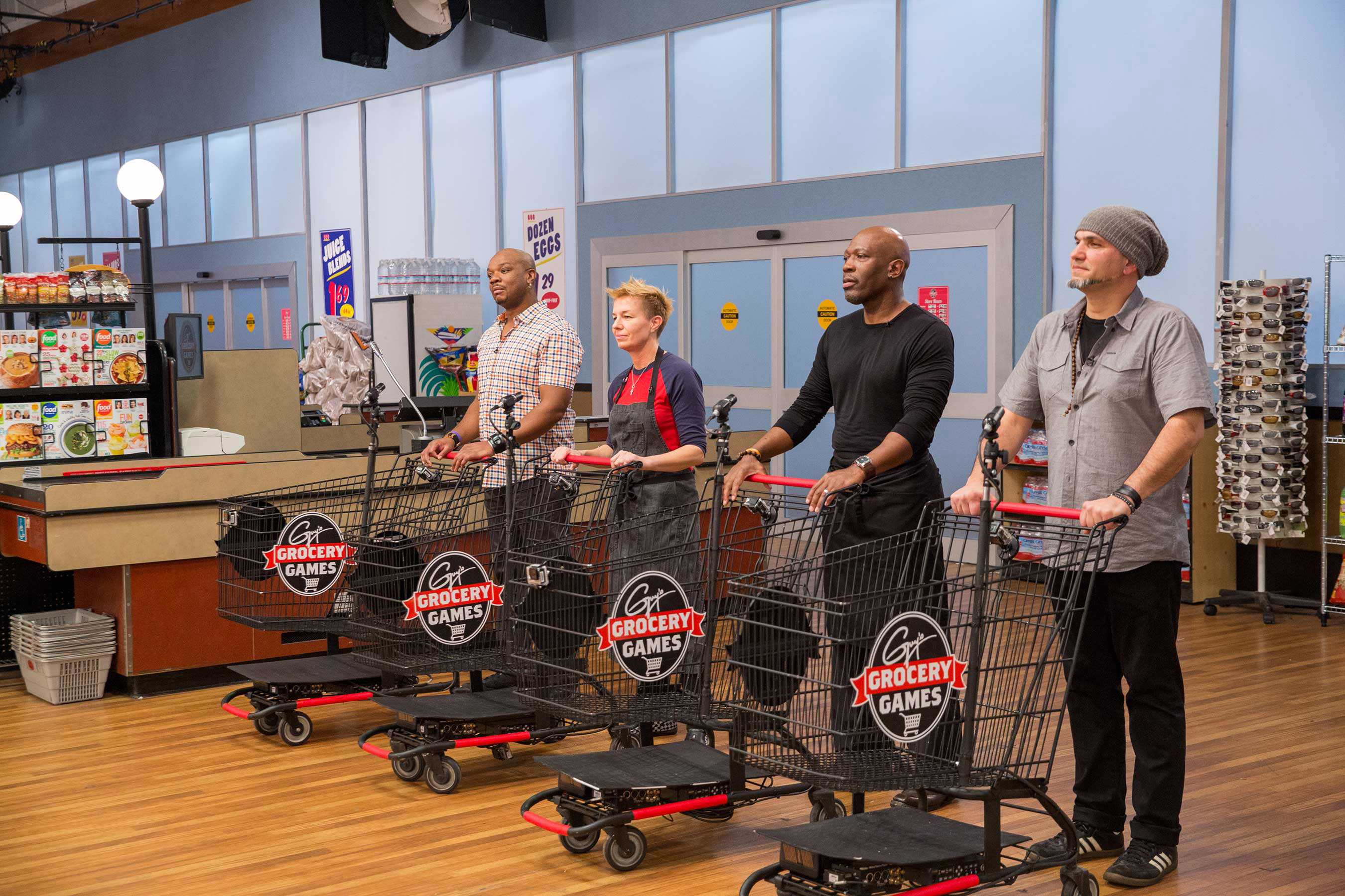 Aaron McCargo, Jr., Elizabeth Falkner, Madison Cowan and Michael Psilakis compete on Food Network's Guy's Grocery Games All-Stars.
