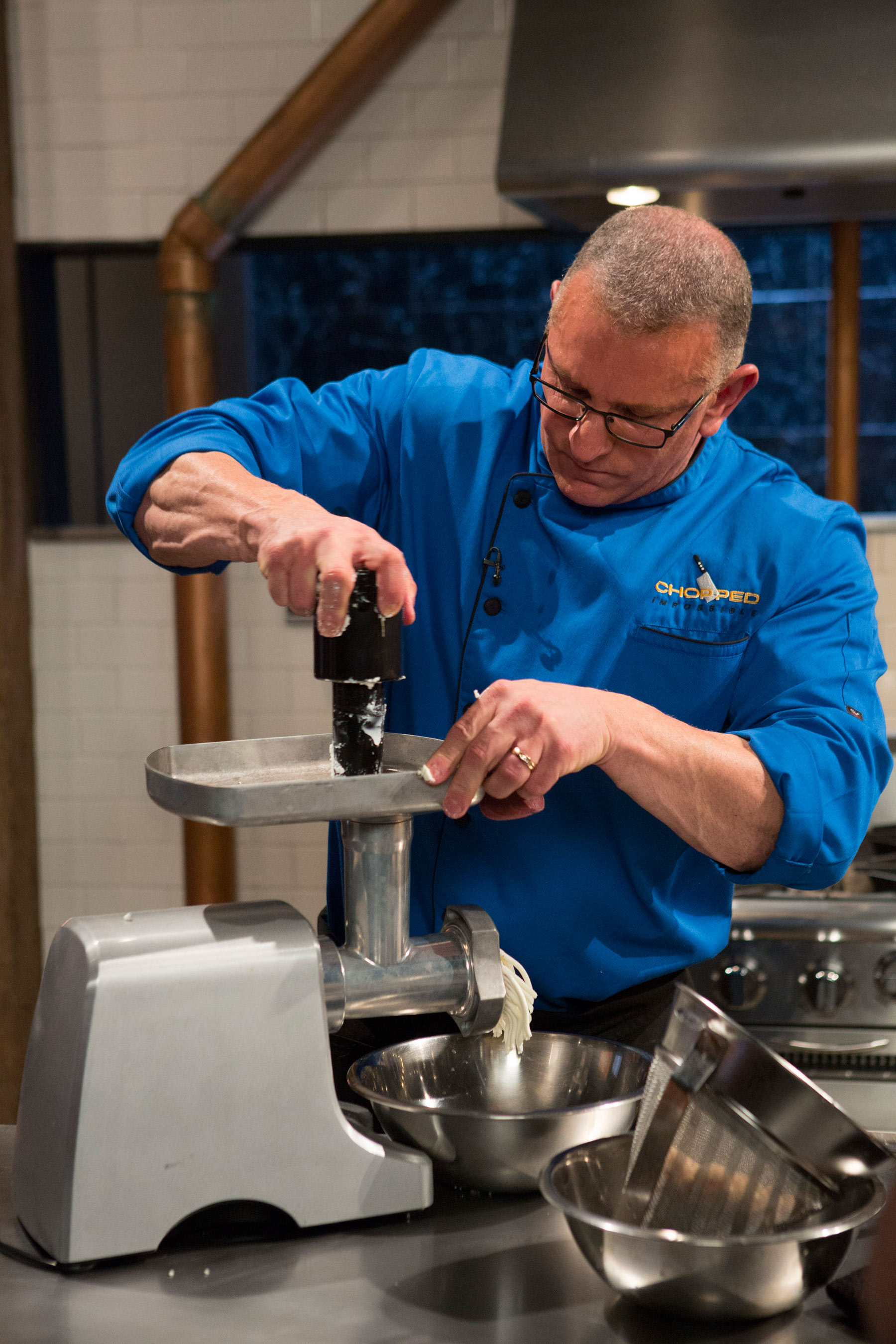 Robert Irvine competes on Food Network's Chopped: Impossible