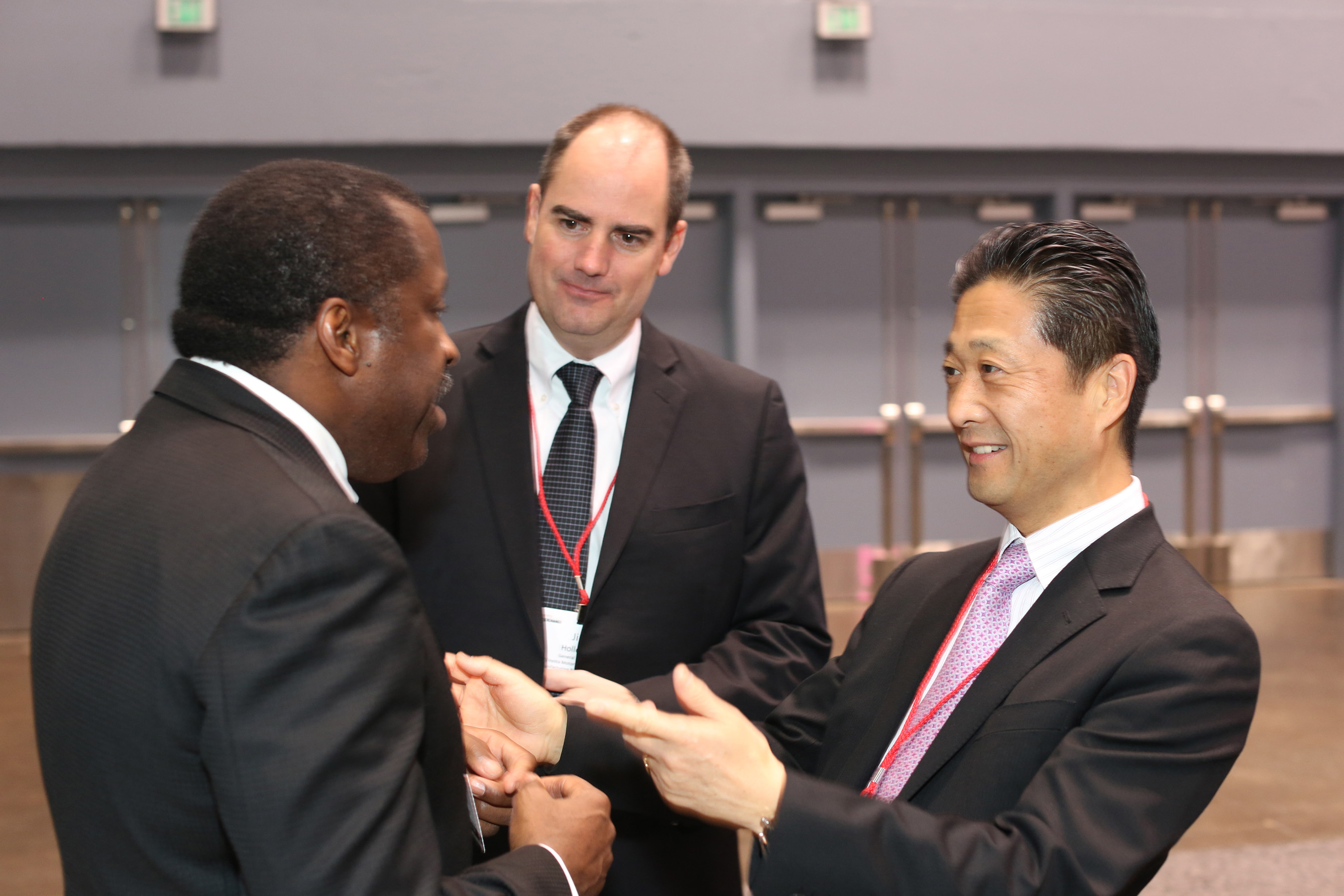 Kevin Shurn, left, owner of Superior Maintenance Co., with Jim Holloway, center, general manager of supplier relations for Toyota Motor Engineering & Manufacturing North America (TEMA), and Osamu “Simon” Nagata, President and CEO, TEMA, at the Toyota Opportunity Exchange.