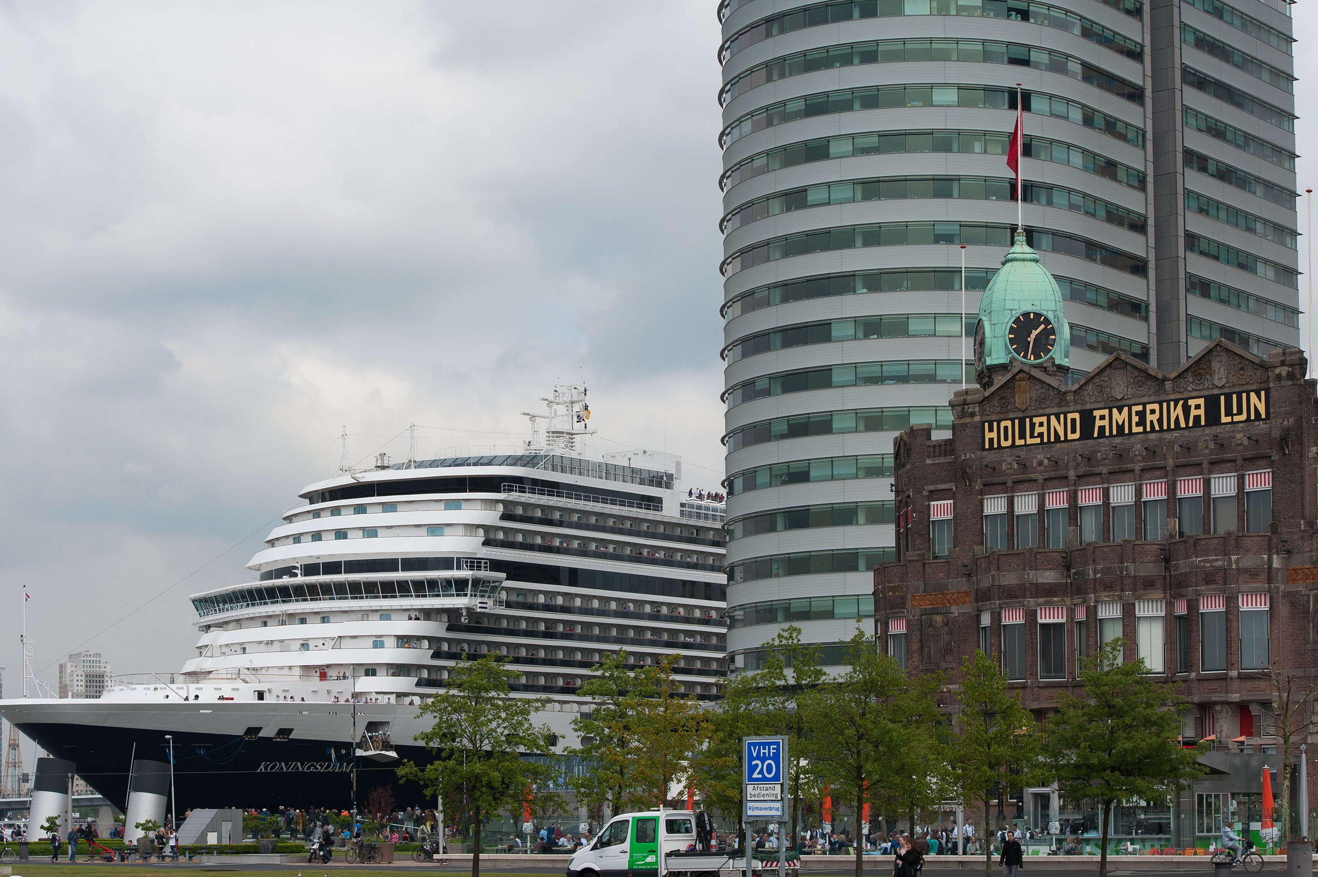 Ms Koningsdam at Rotterdam Cruise Terminal, located near the company’s original headquarters, now the Hotel New York (brick building to right). Holland America Line was founded in Rotterdam in 1872.