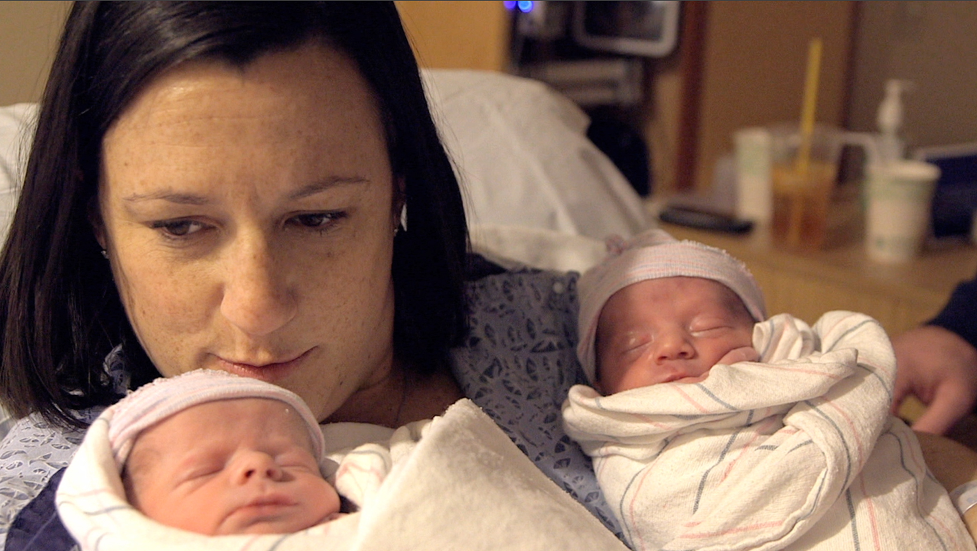 Award-winning documentarian Patrick Creadon (not in image) captures Lauren Sweeney from Boston, MA holding her twin boys for the first time for the short film Wishes for Baby from Fisher-Price, Inc.