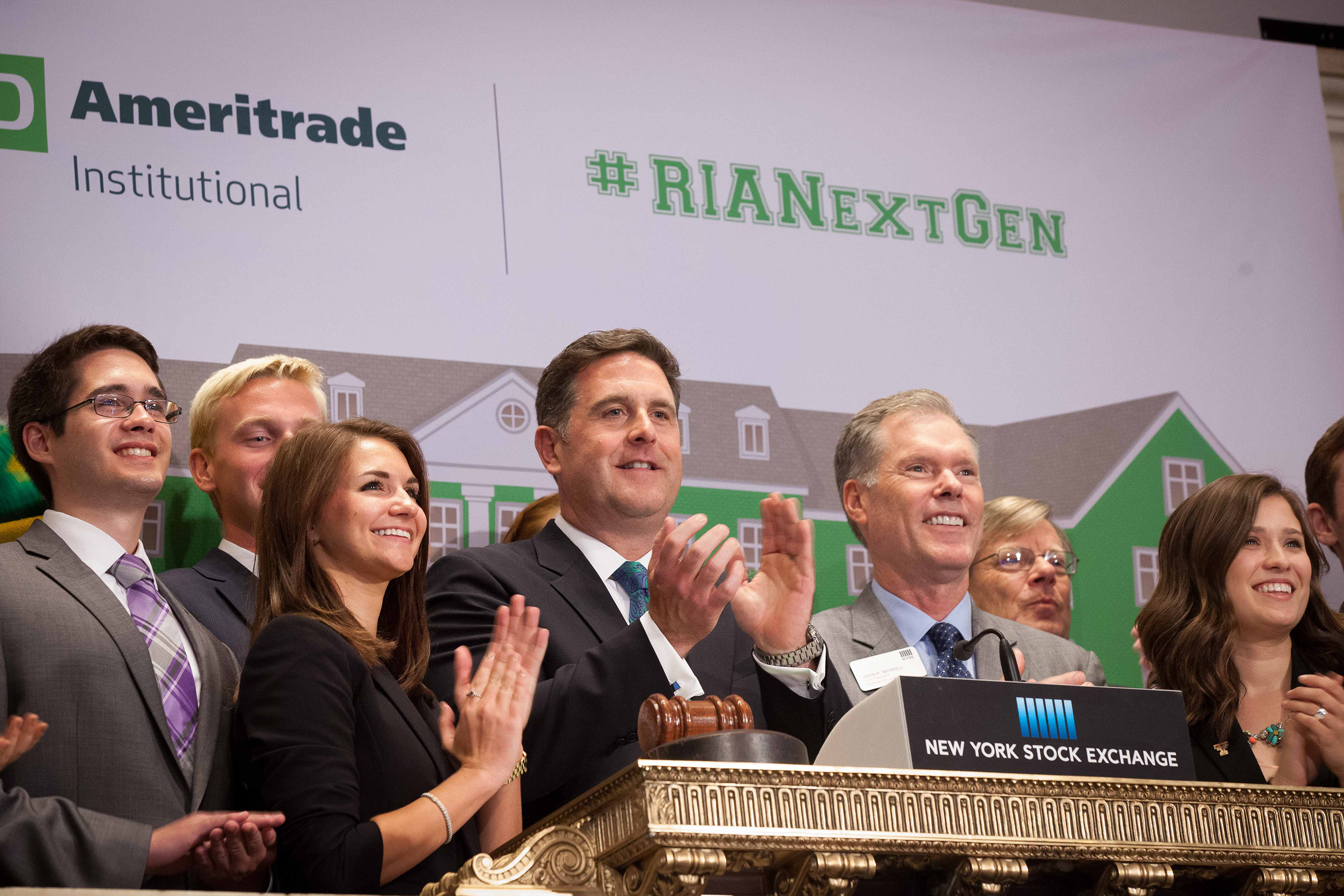 Tom Nally, President, TD Ameritrade Institutional (Center) joins future financial planners in ringing the Closing Bell at the New York Stock Exchange