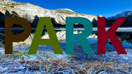 "PARK" with mountain range in background
