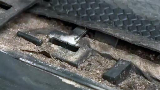 Close up image of the sand and debris left by flood damage