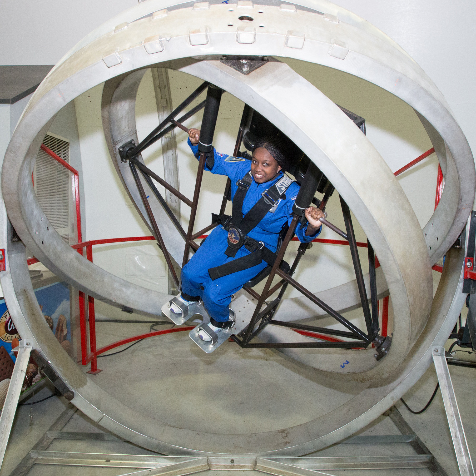 Honeywell Leadership Challenge Academy participants are able to go for a spin in simulated astronaut training exercises.