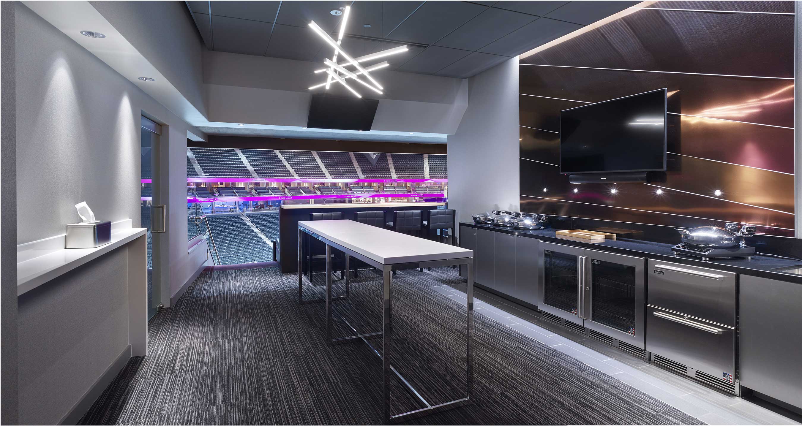 Forty-four loge boxes line the third level with seats for 16 guests, suite attendants and individual kitchenettes.