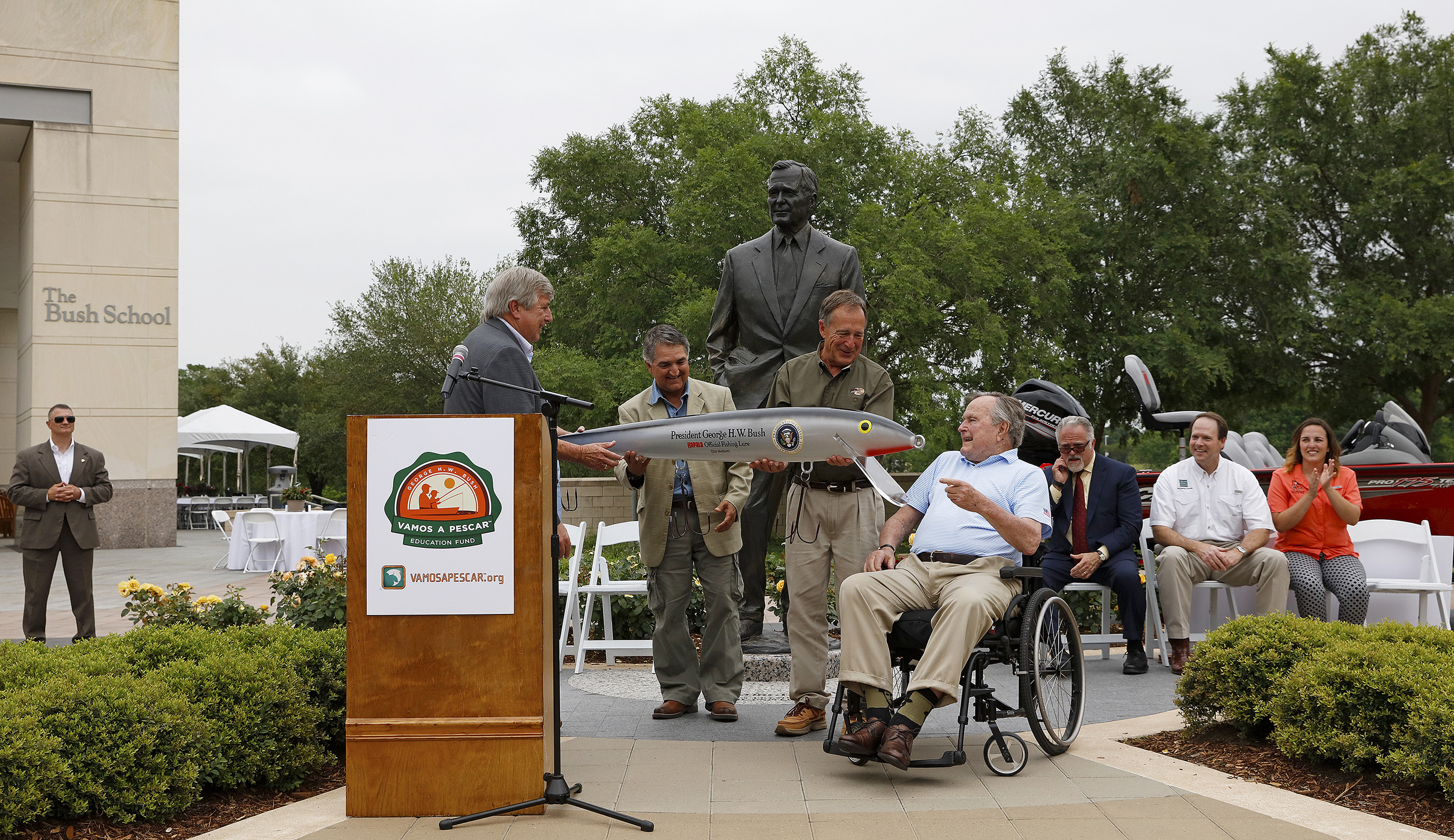 President George H.W. Bush is presented with a commemorative lure during a Recreational Boating & Fishing Foundation (RBFF) event at the George Bush Presidential Library on Thursday, April 14, 2016, in College Station, Texas. RBFF is a nonprofit organization whose mission is to increase participation in recreational angling and boating, thereby protecting and restoring the nation’s aquatic natural resources. (Aaron M. Sprecher/AP Images for RBFF)