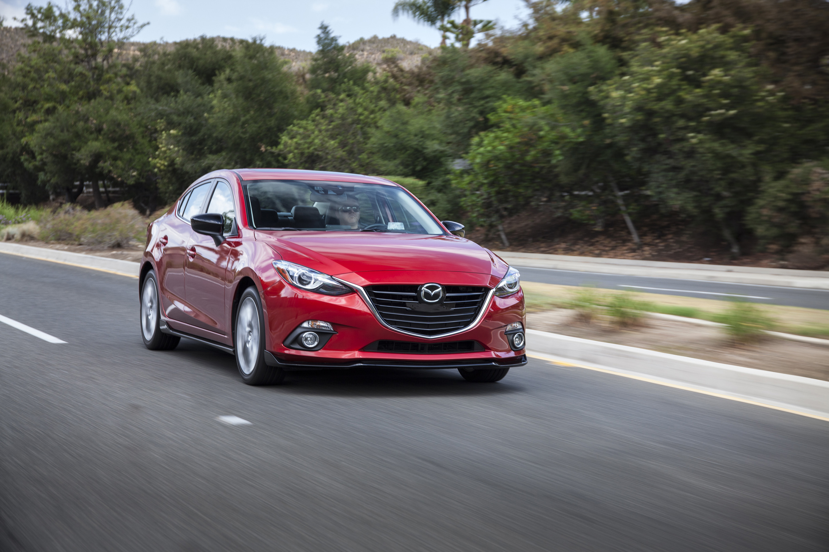 KBB.com 10 Coolest Cars: Gorgeous and sporty outside, as well as inside, the Mazda3 has been named one of our 10 Coolest Cars Under $18,000 every year of its existence.
