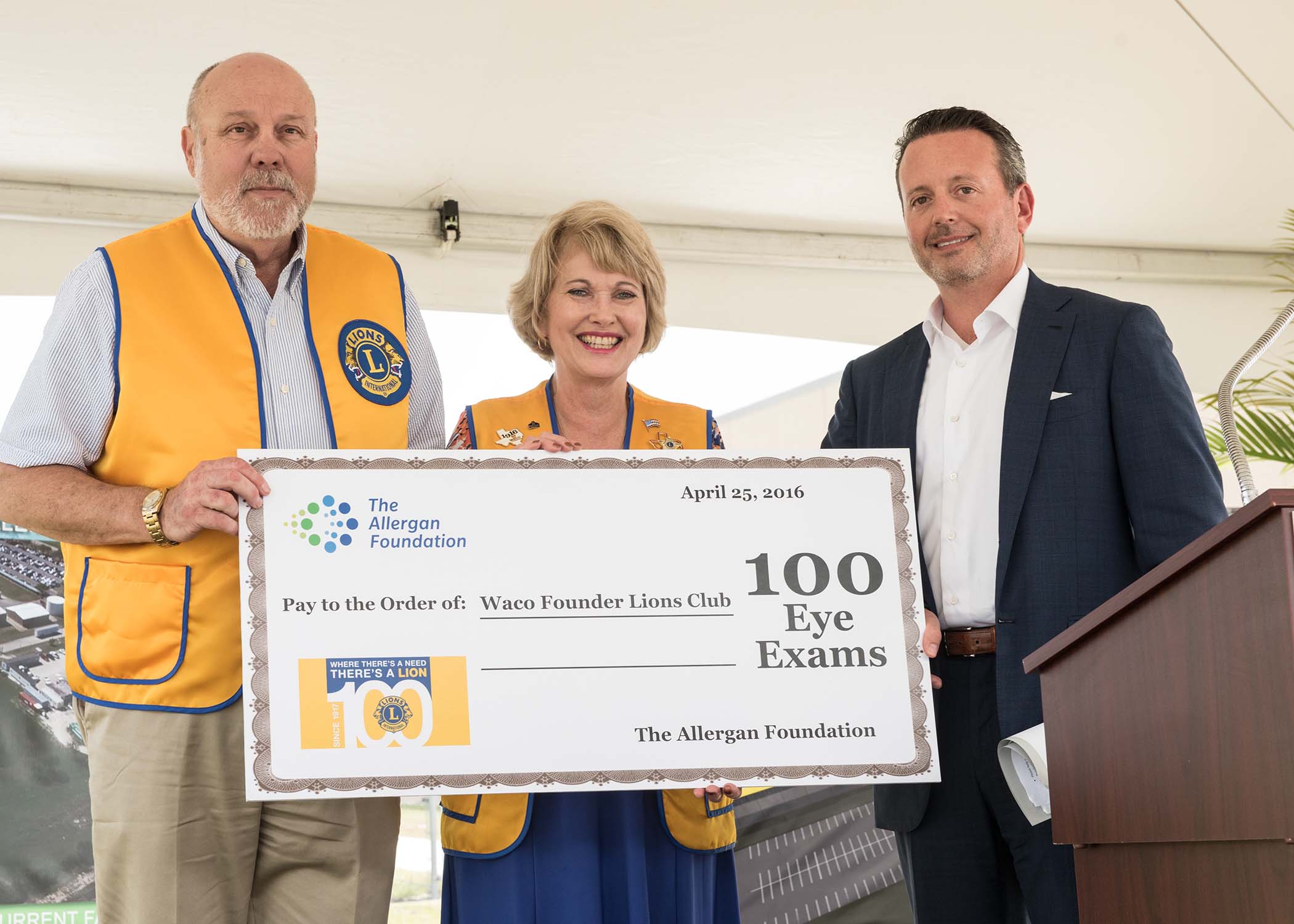 Allergan President & CEO Brent Saunders presents a donation of 100 eye exams to Waco Lions Club President Buck Rogers and Past President and Vision Screening Chair Louise Ann Powell. The donation, by the Allergan Foundation, is in recognition of Lions Club International’s 100 year anniversary The donation will allow the Waco Founders Lions Club to initiate a pilot project coordinating with local eye care professionals to support eye exams for those in need in the Waco community.