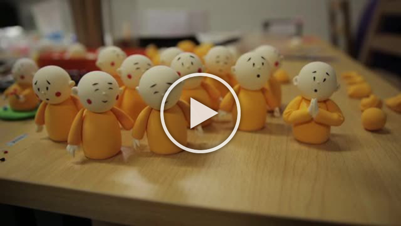 Beijing's Longquan Temple has adopted modern methods to promote Buddhism, including animation and robotics.