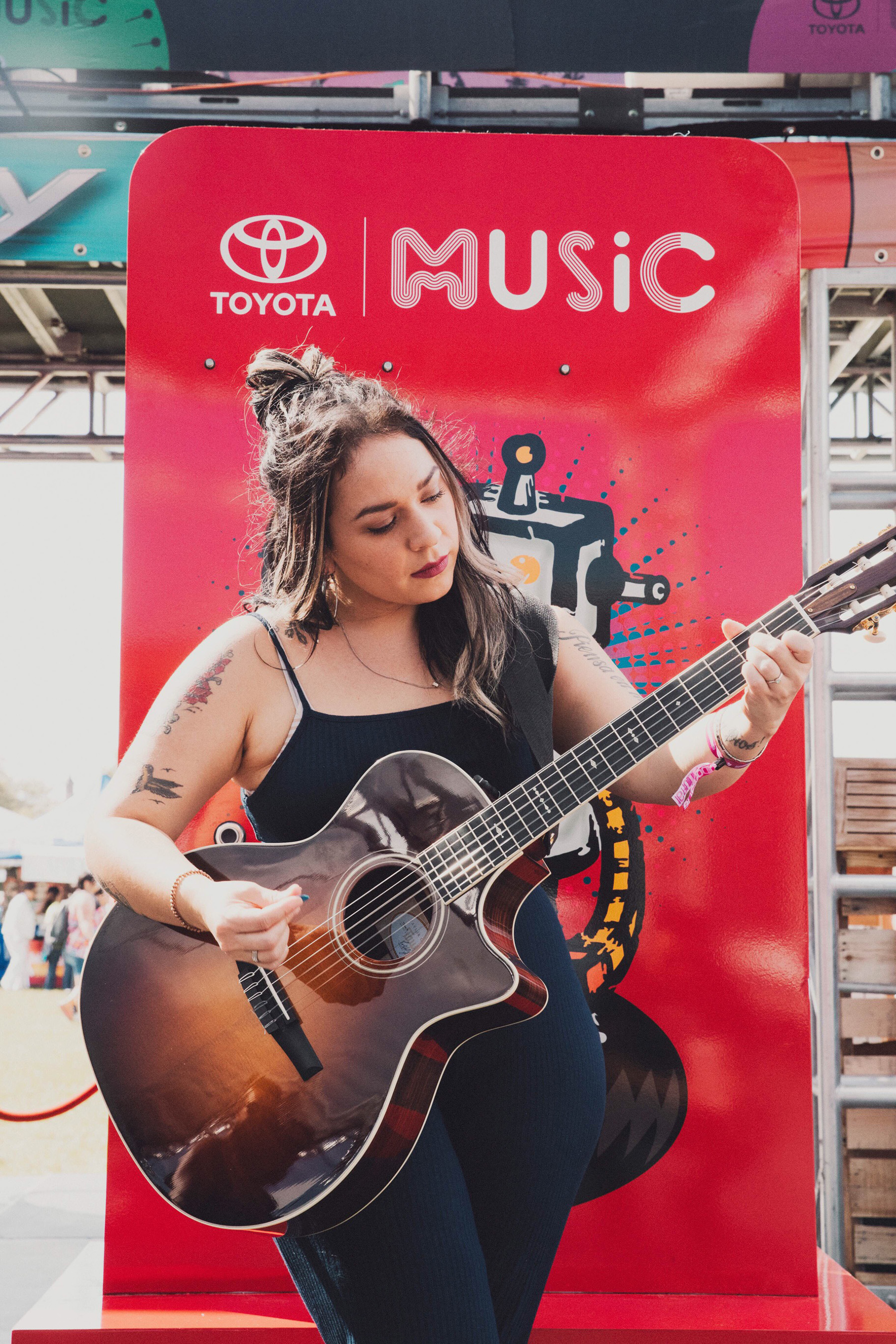 Singer and composer, Carla Morrison, strums a note at the Toyota Música tent before her performance on Friday, July 8 during Ruido Fest 2016 in Chicago.