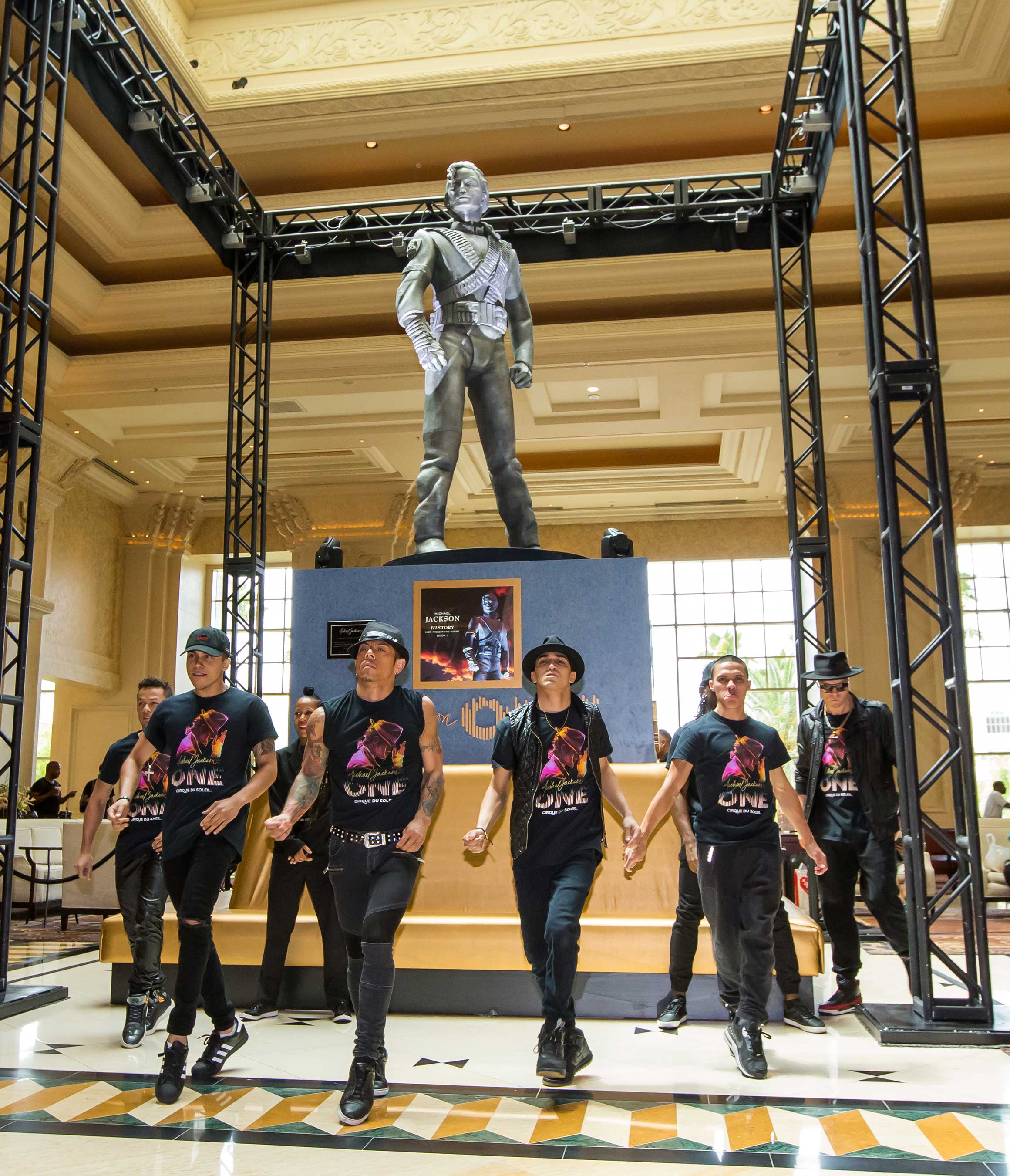 MJ ONE Cast Members Welcome Michael Jackson HIStory Statue