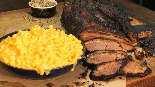 mac n’ cheese topped with slow-smoked meat.