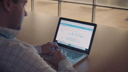 Man on laptop computer accessing the St. Jude Cloud