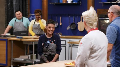 Robert Irvine and Anne Burrell evaluate recruit Linda Martin's dish on Food Network's Worst Cooks in America