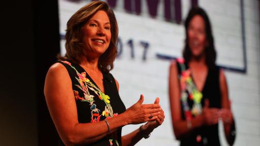 Lynne Doughtie, KPMG US Chairman and CEO standing in front of an audience.