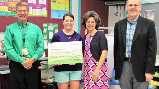 In the photo are Fred Womble - CenturyLink Manager of Regional Operations, LeAnn Nixon, Sheila Evans - White Oak Principal, and Larry Mathiot - CenturyLink Public Policy Manager.
