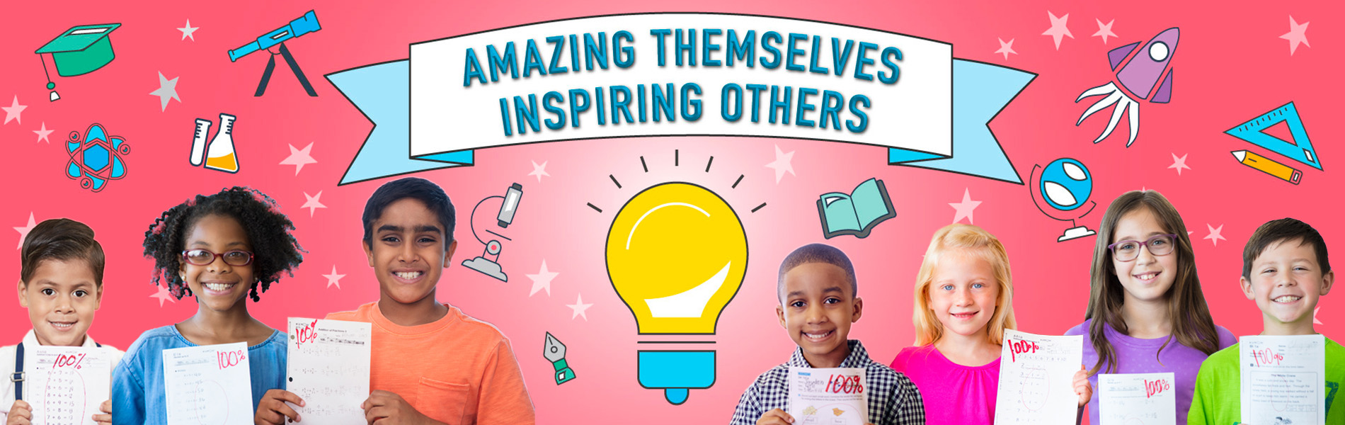 Kids holding up papers with 100% correct answers on them.