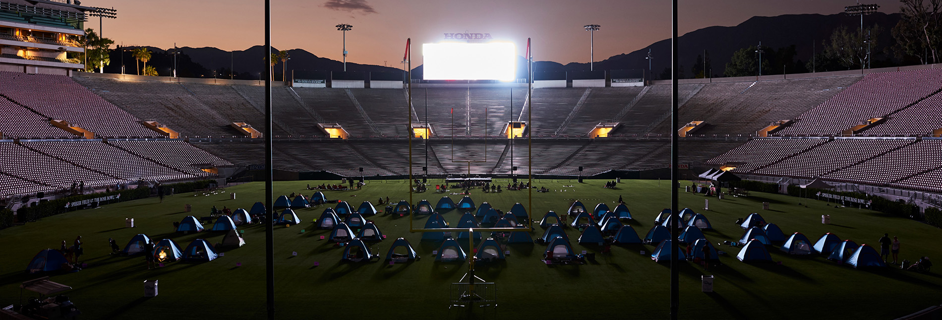 Camping on the field in an arena.