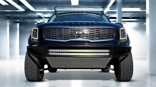 Front view with the undercarriage of a black Telluride vehicle.