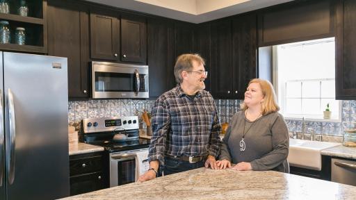 Wood Family standing in kitchen