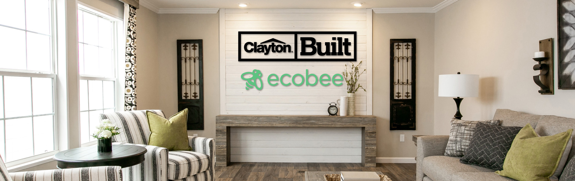 Clayton and ecobee signs on a wall in a living room