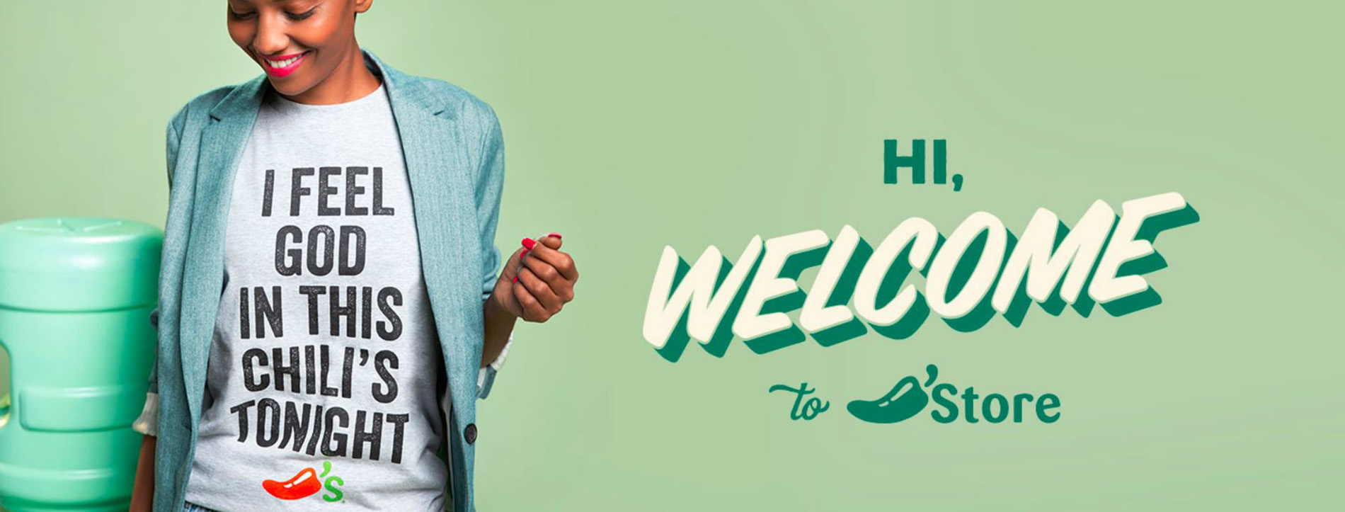 People in Chili&rsquo;s new t-shirt by a water cooler.