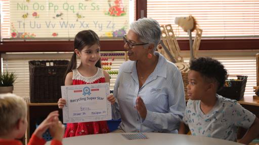 Woman and children at a table