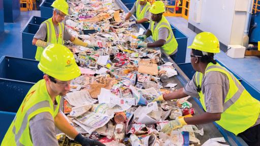 Sorting recyclables at a Republic Services facility.