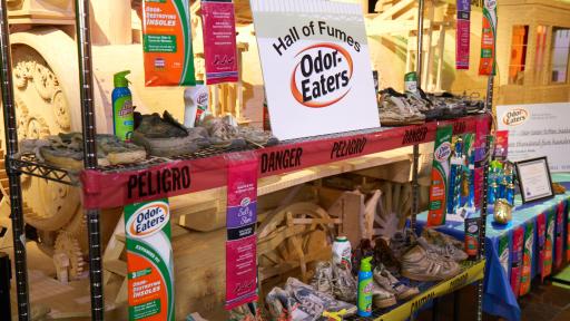 Dirty sneakers on racks with Odor-Eaters products