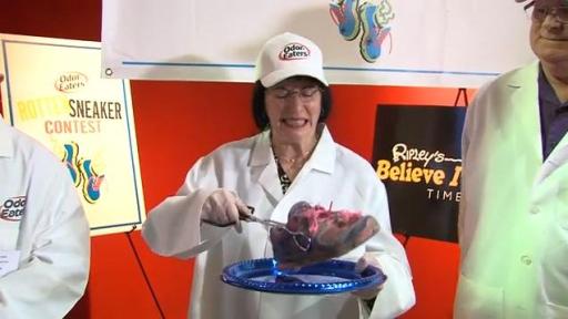 Judge smelling shoe at Rotten Sneaker Contest