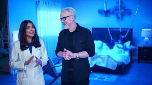 Adam Savage and Dr. Ogden standing in bedroom