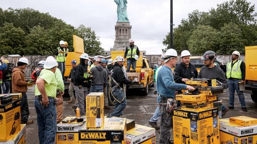 Construction crew un-boxing DEWALT tools at the the Statue of Liberty Museum job site