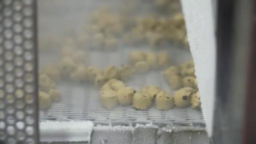 Video showing creation of cookie dough and its inclusion in Ben & Jerry's ice cream.