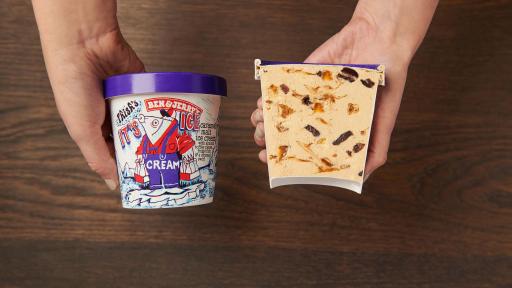 Hands holding Phish's It's Ice... Cream product split in half showing the inside of ice cream tub