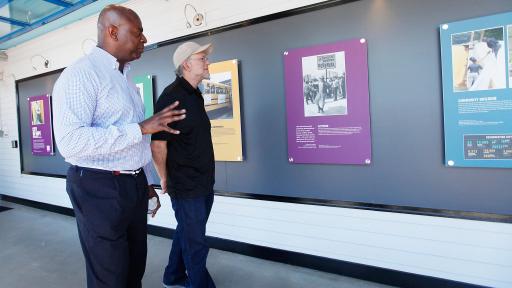 Smithsonian curator Dr. Aaron Bryant gives a personal tour of the exhibit to Ben & Jerry&rsquo;s co-founder Jerry Greenfield.