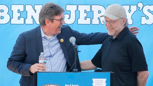 Ben & Jerry&rsquo;s CEO Jostein Solheim welcomes Co-Founder Jerry Greenfield at the opening of an exhibit on the 1968 Poor People&rsquo;s Campaign at the company&rsquo;s Vermont ice cream factory.
