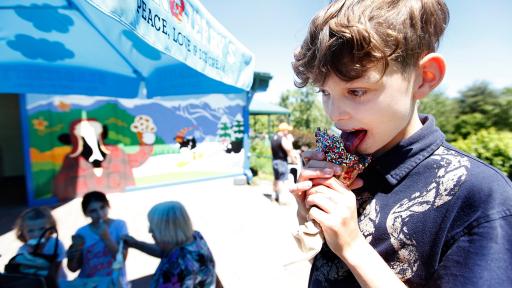 young boy eating ice cream at Ben & Jerry&rsquo;s factory in Waterbury, VT
