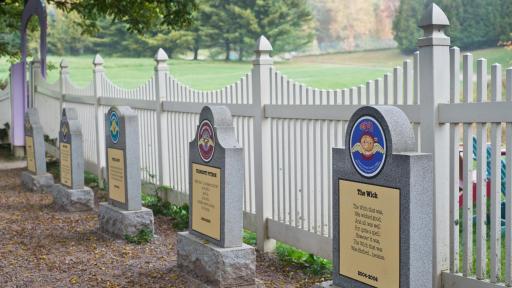 A graveyard with tombstones showing the various flavor names that have been depinted.