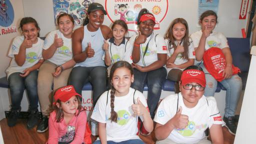 Kids give thumbs-up for Serving Up Smiles initiative.