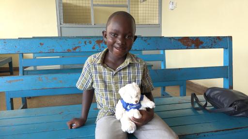A young African boy with a healthy mouth after Smiletrain's intervention.